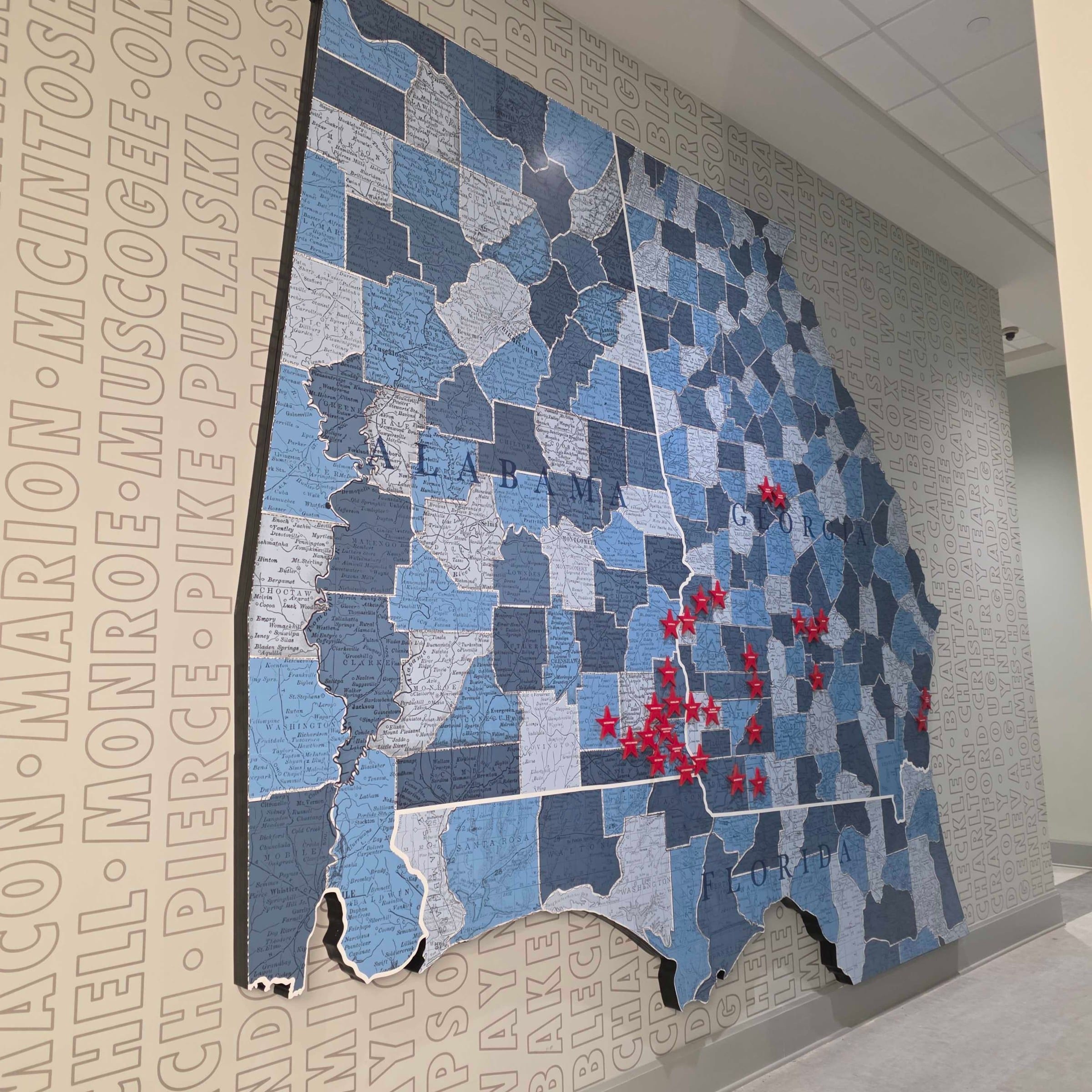 Map wall vinyl and stars (state map of counties), Five Star Credit Union, Dothan, AL, by High Stakes Creative