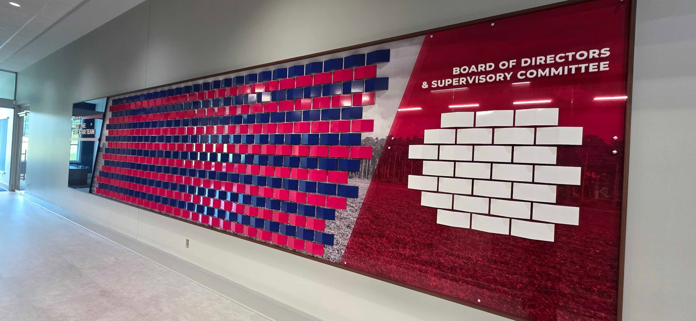 "Meet the Five Star team" and board of directors wall, Five Star Credit Union, Dothan, AL, by High Stakes Creative