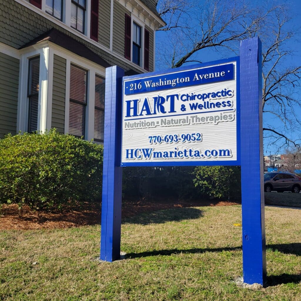 Post-and-panel sign with blue posts, 216 Washington Avenue, Hart Chiropractic & Wellness, Marietta, GA, by High Stakes Creative