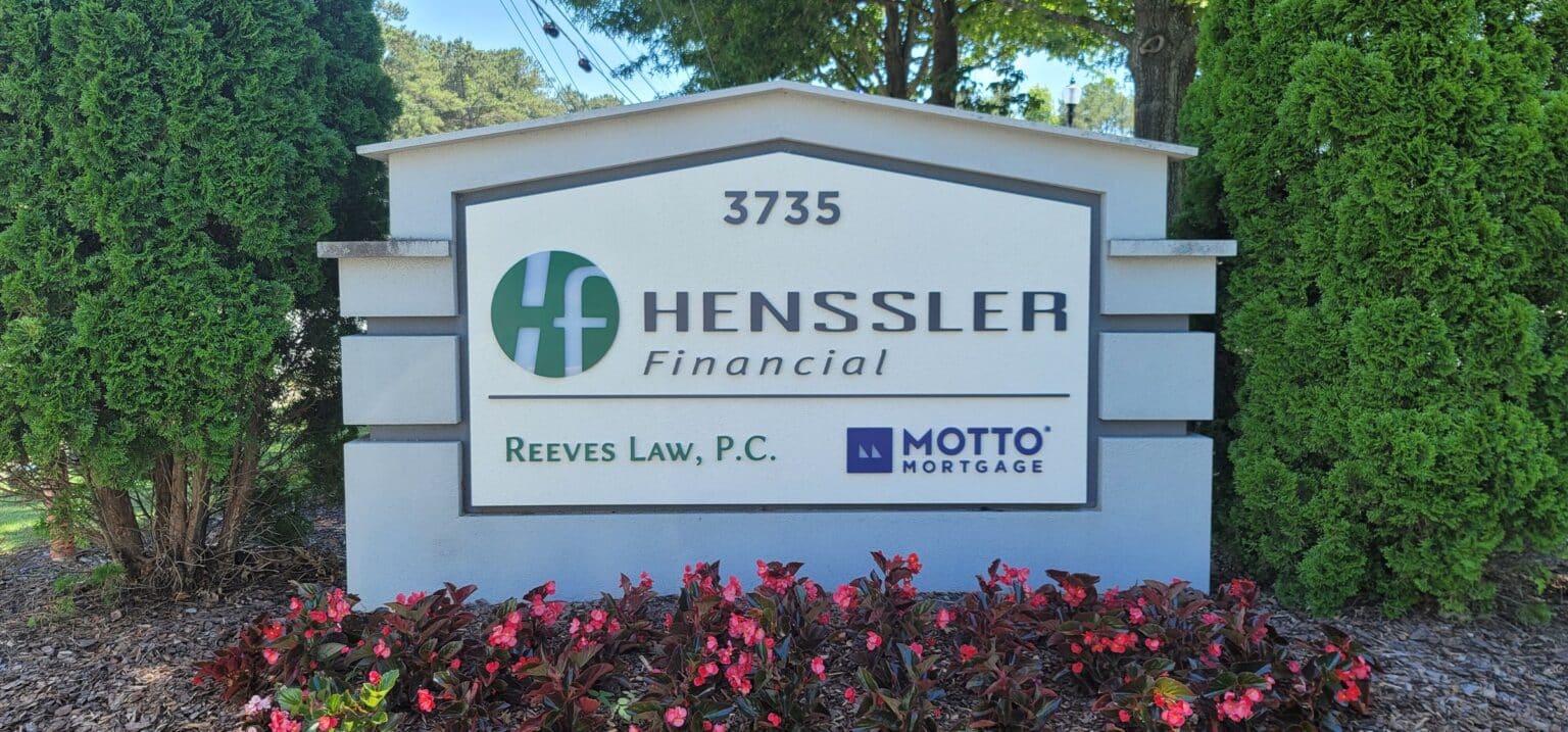 Monument with Henssler Financial, Reeves Law and Motto Mortgage panels, Henssler Financial, Kennesaw, GA, by High Stakes Creative