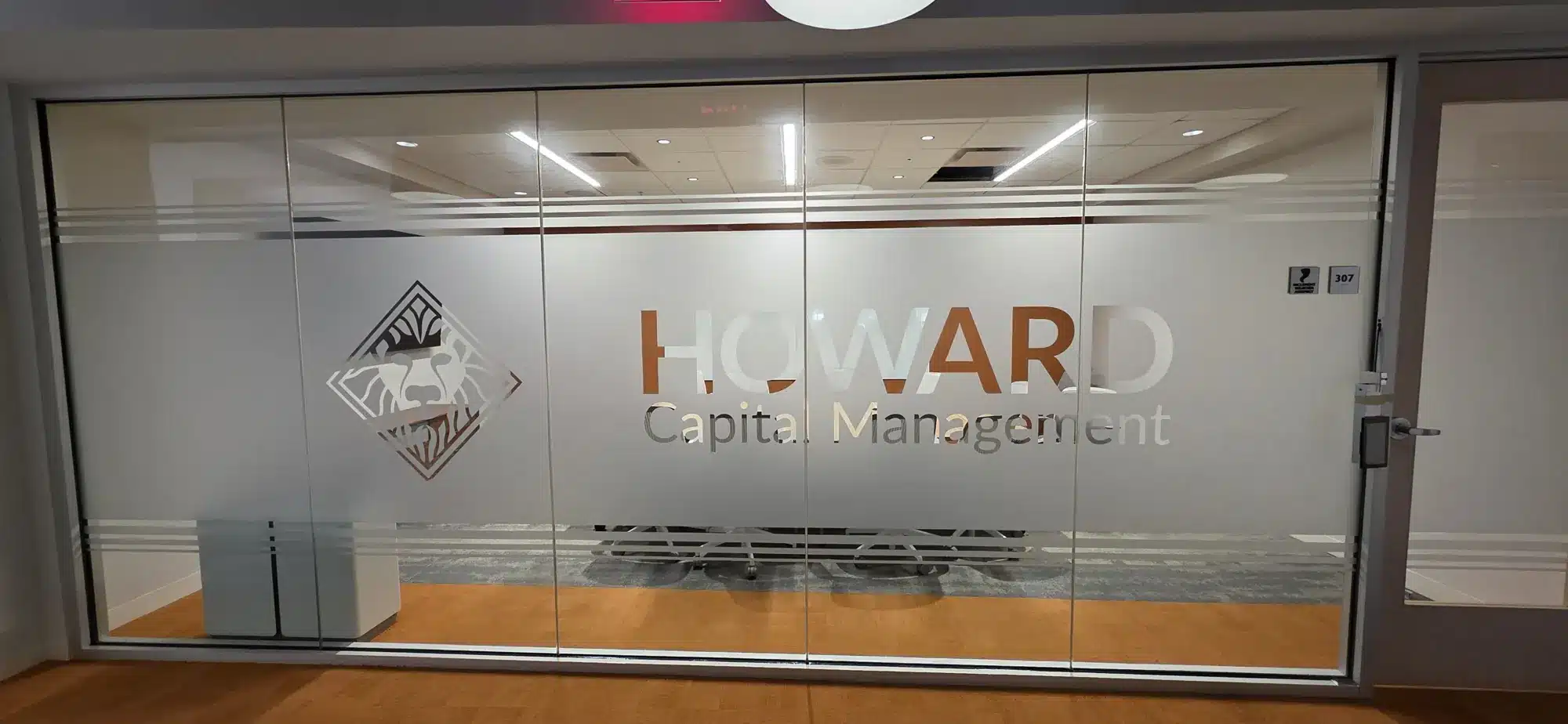 Frosted glass office branding, Howard Capital Management, Roswell, GA, by High Stakes Creative