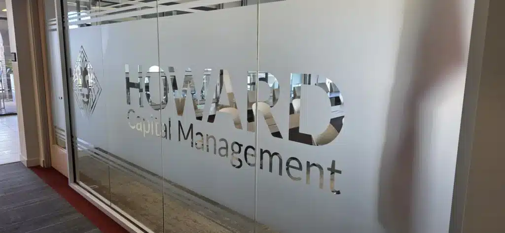 Dimensional logo on frosted glass, Howard Capital Management, by High Stakes Creative