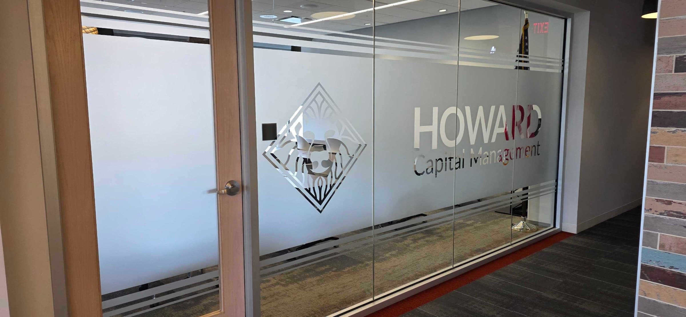 Glass logo detail, Howard Capital Management, Roswell, GA, by High Stakes Creative