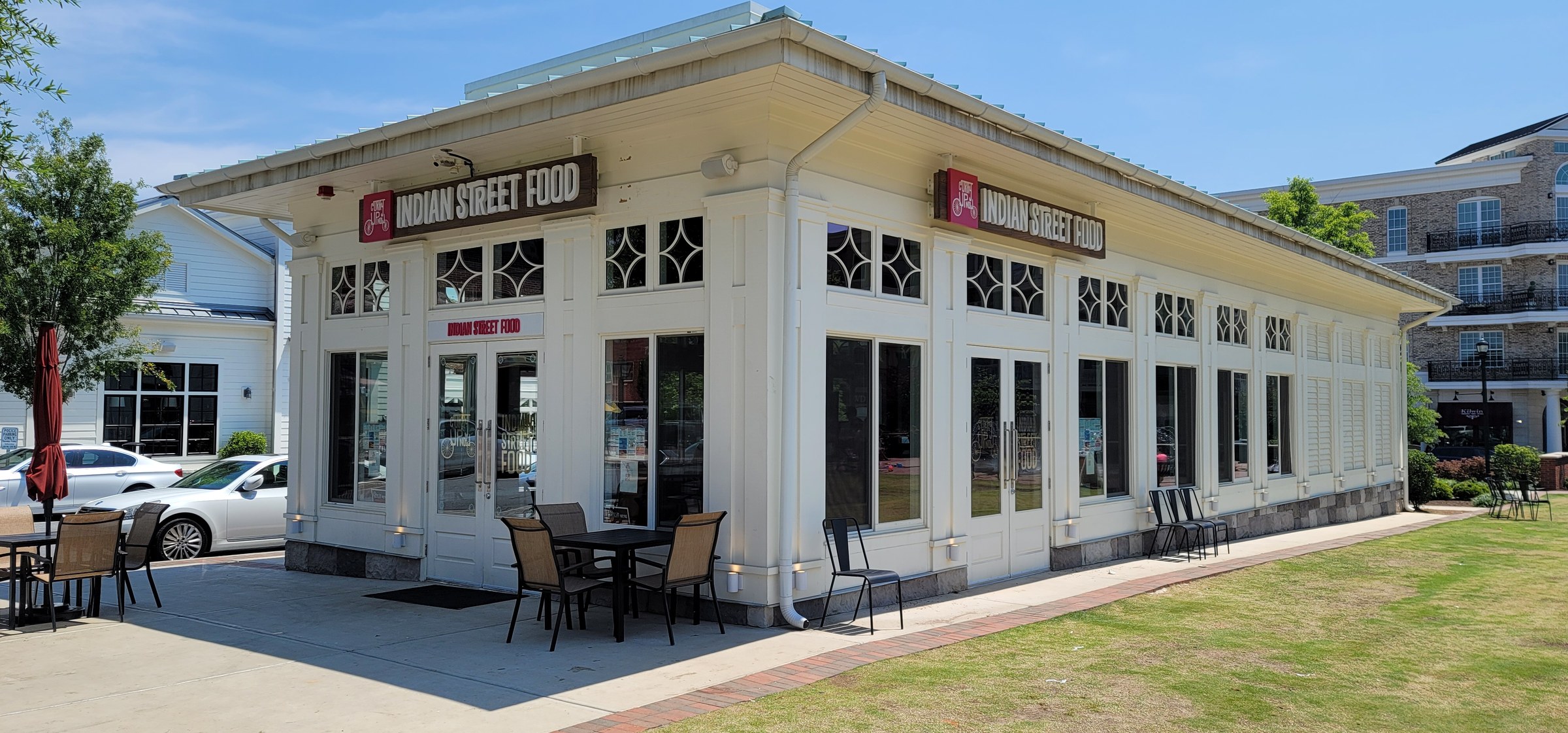 Restaurant building with signage on two sides, Indian Street Food, by High Stakes Creative