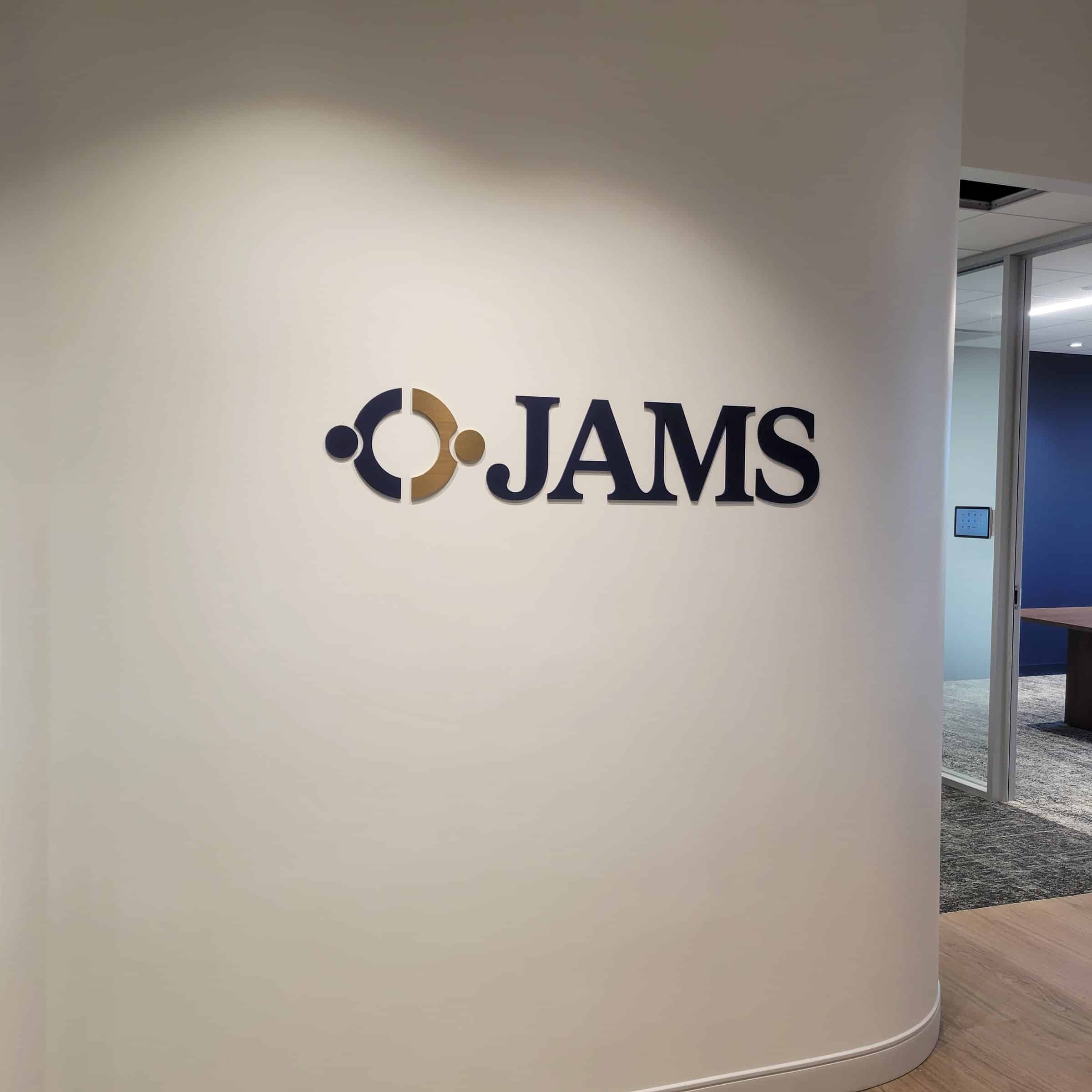 Dimensional logo on curved reception wall, JAMS, by High Stakes Creative