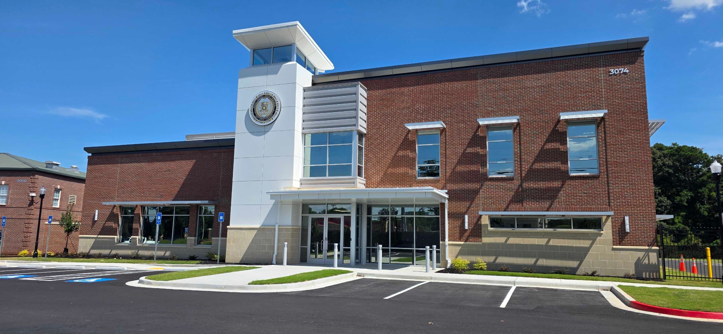 New headquarters building signage and seal, Kennesaw Police Department, Kennesaw, GA, by High Stakes Creative