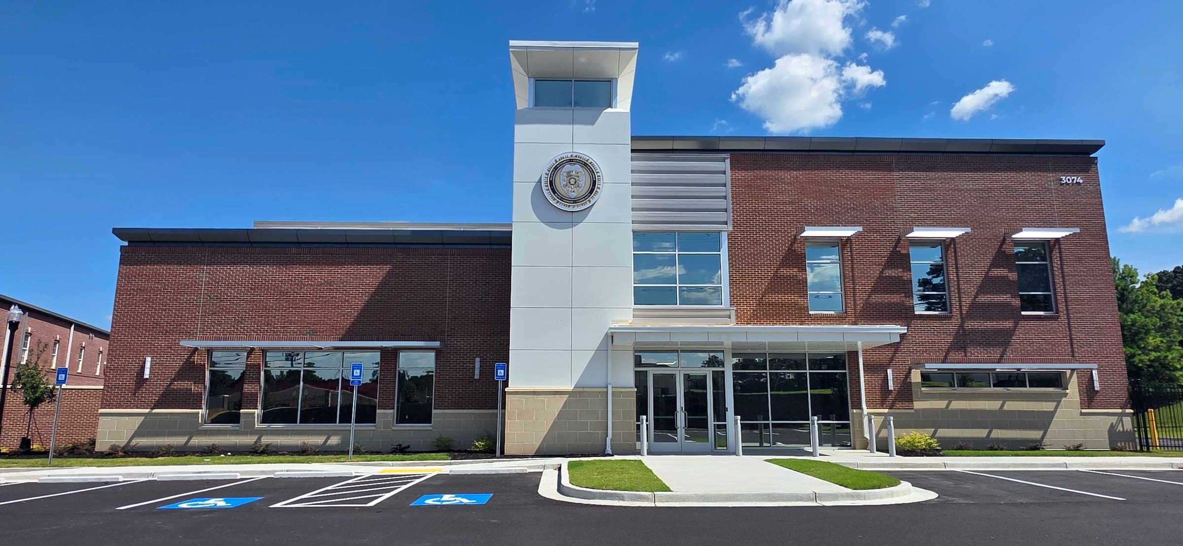 New headquarters building signage and seal, Kennesaw Police Department, Kennesaw, GA, by High Stakes Creative