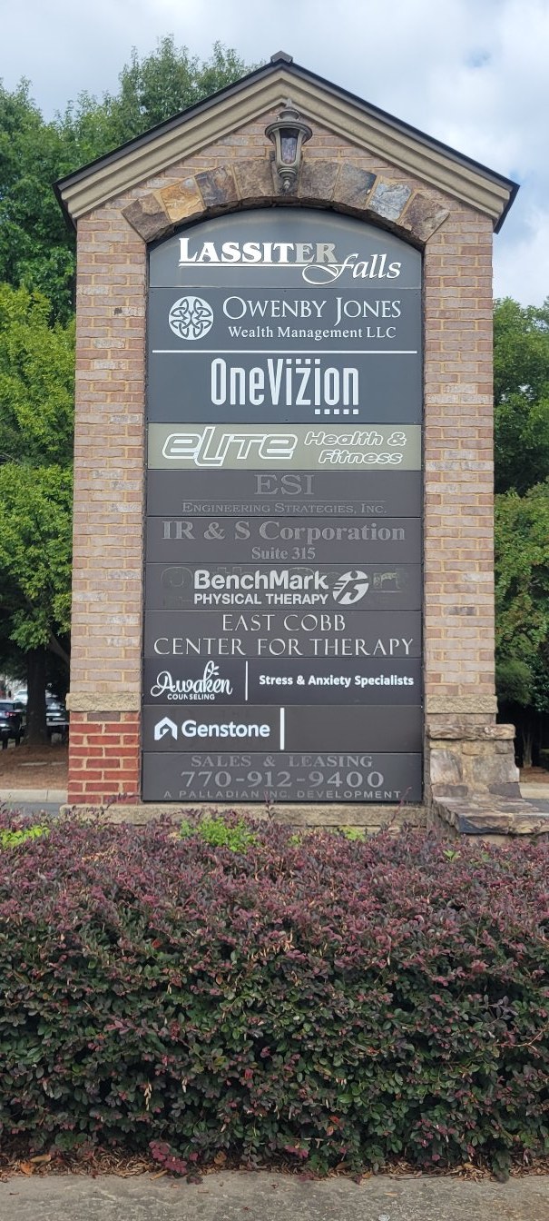 Brick multi-tenant monument with tenant panels, Lassiter Falls, Marietta, GA, by High Stakes Creative