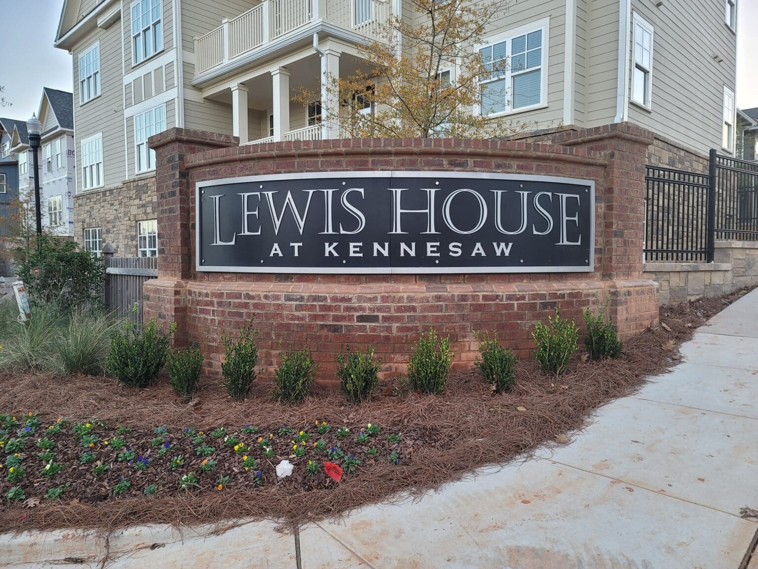 Brick monument with dimensional Lewis House at Kennesaw panel, Lewis House at Kennesaw, by High Stakes Creative