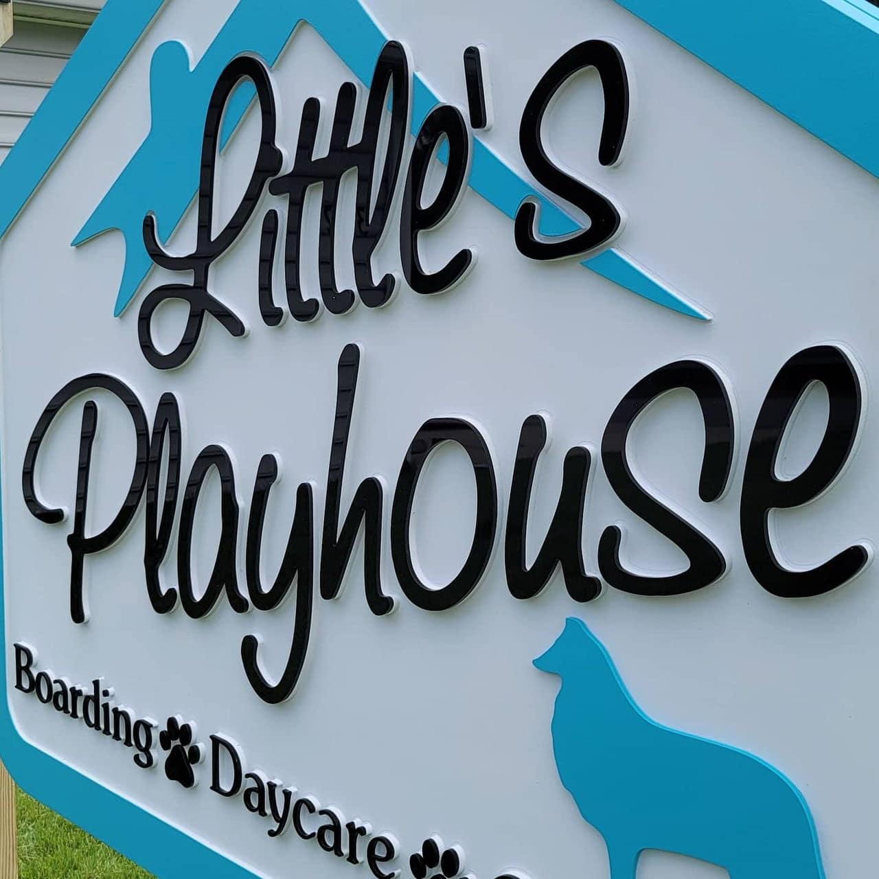 Close-up of dimensional lettering and dog silhouette, Little's Playhouse, by High Stakes Creative