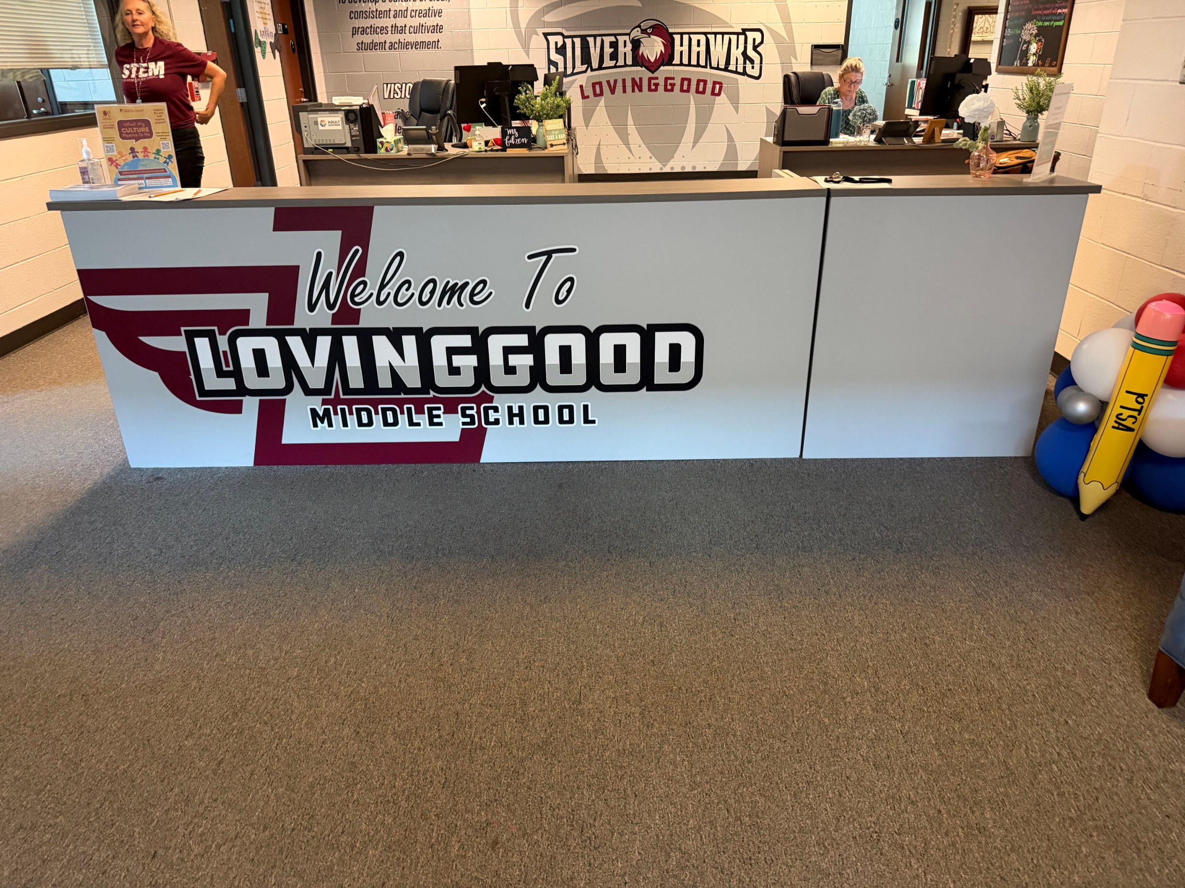 Front office welcome desk graphics, Lovinggood Middle School, Powder Springs, GA, by High Stakes Creative