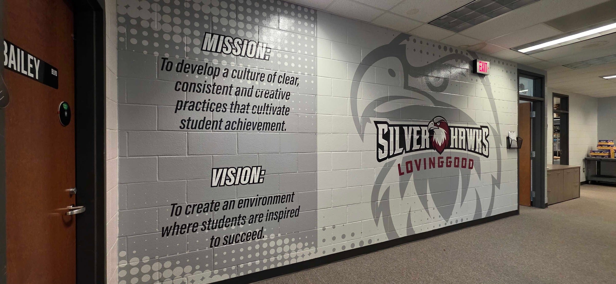Silver Hawks hallway and front office wall graphics, Lovinggood Middle School, Powder Springs, GA, by High Stakes Creative