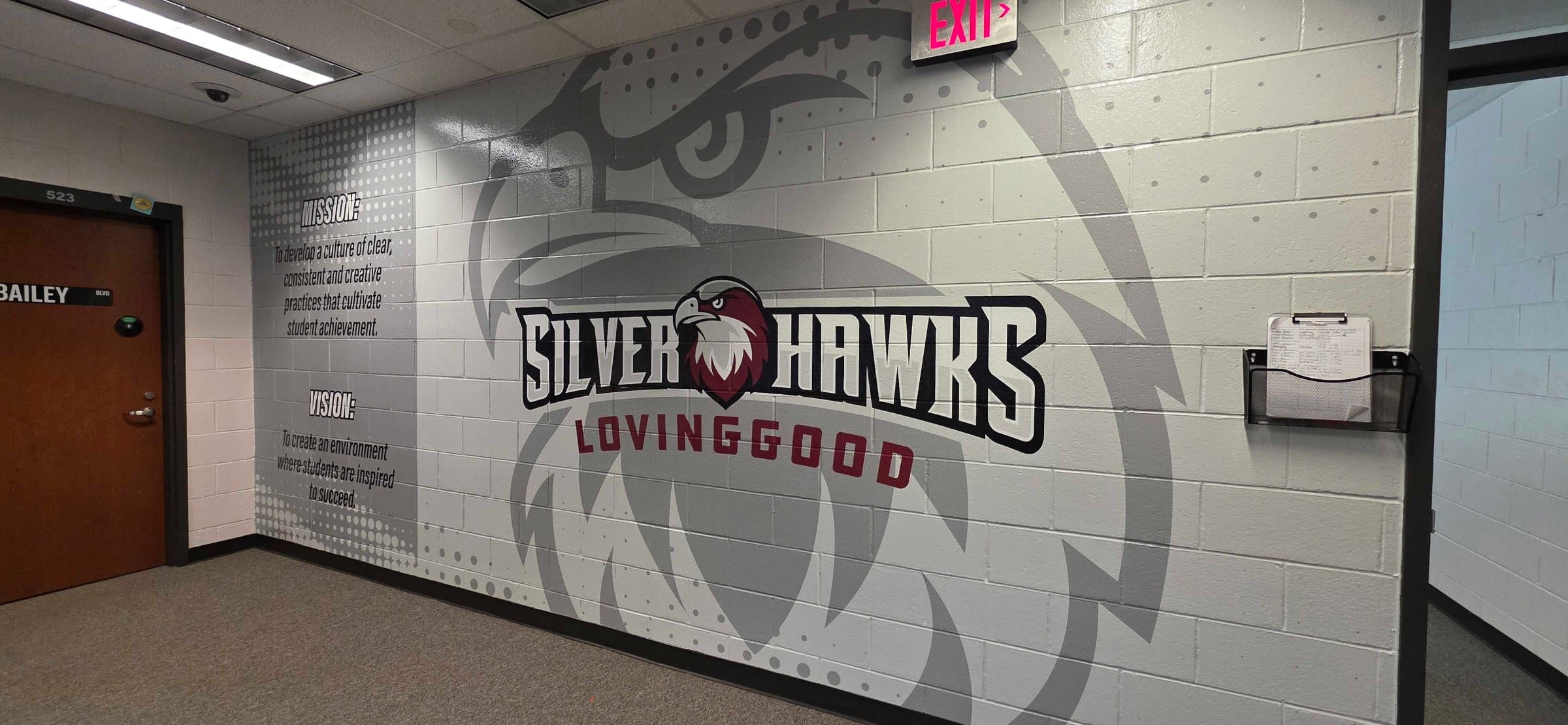 Silver Hawks hallway and front office wall graphics, Lovinggood Middle School, Powder Springs, GA, by High Stakes Creative