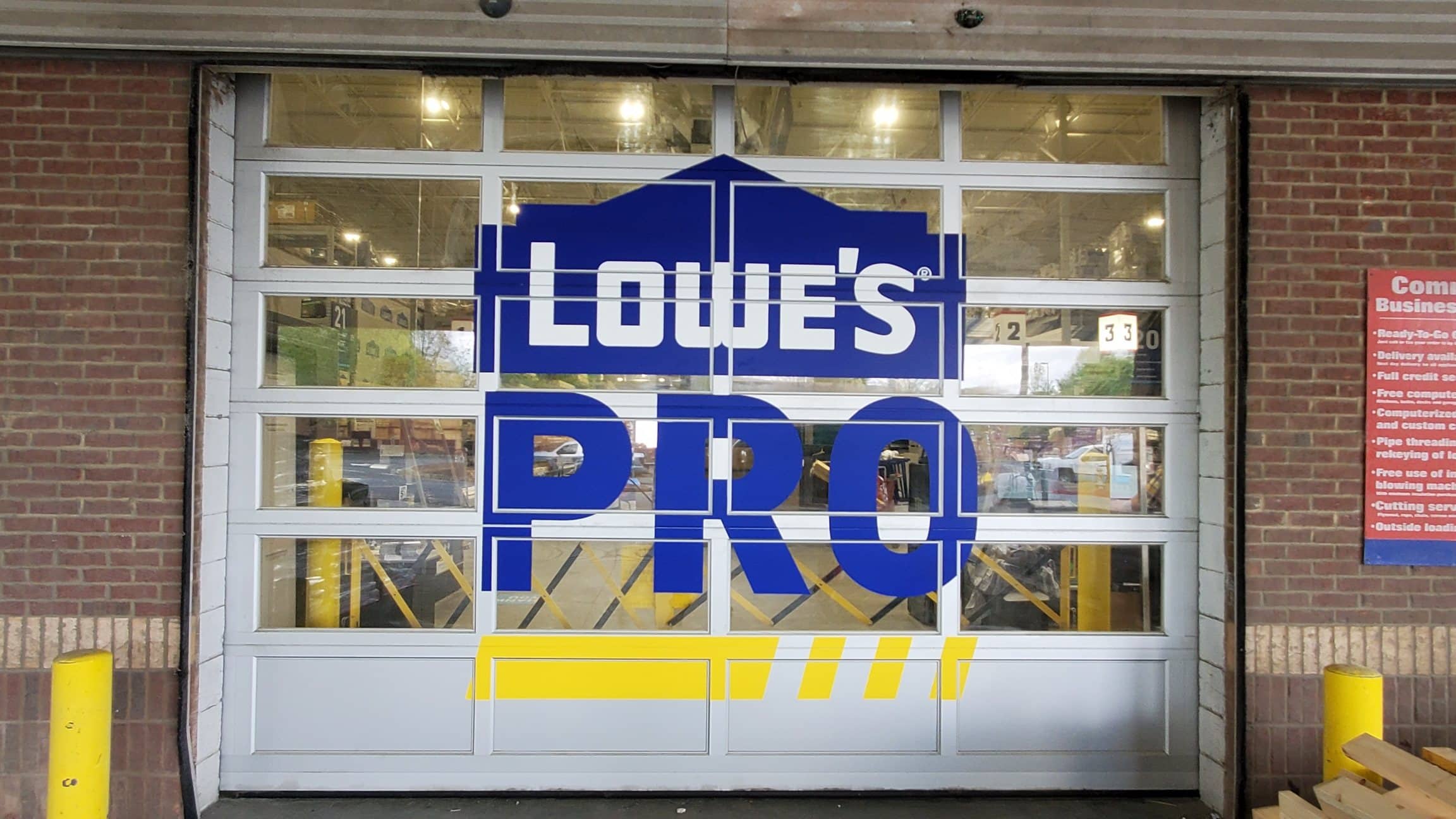 Lowe's PRO graphic on glass overhead door, Lowe's, Suwanee, GA, by High Stakes Creative