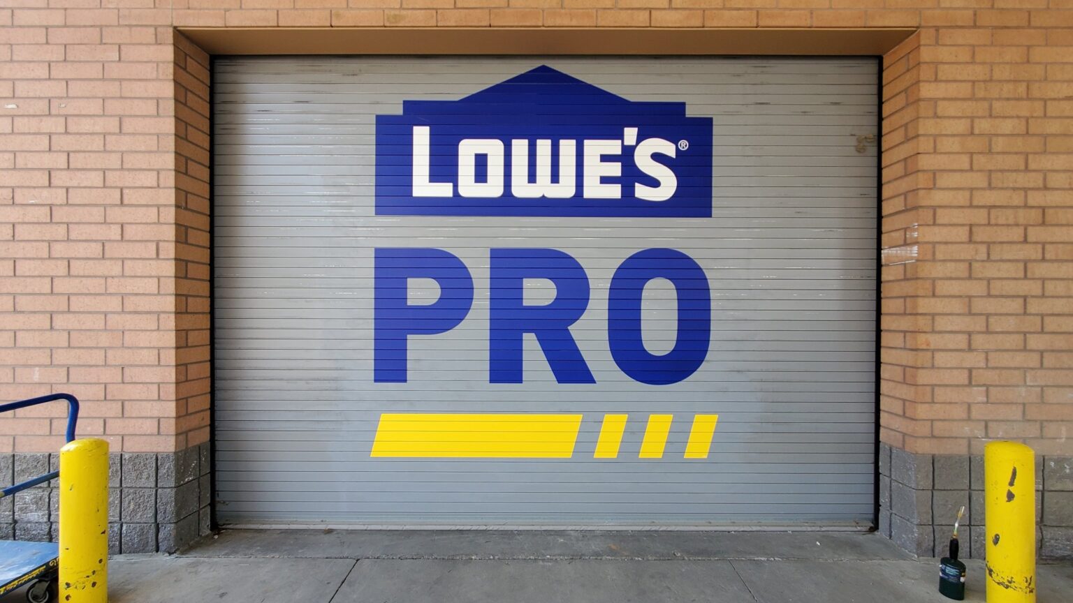 PRO entrance roll-up door wrap, Lowe's, Alpharetta, GA, by High Stakes Creative