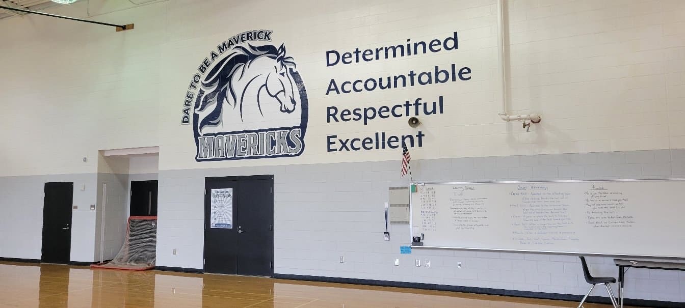 "Dare to be a Maverick" mustang logo and Determined/Accountable/Respectful/Excellent value, Mavericks, by High Stakes Creative