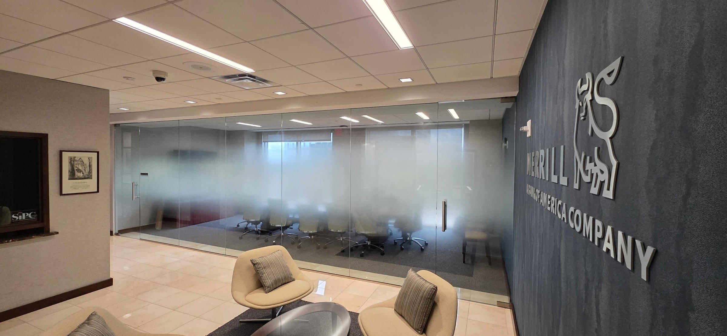Office frosted glass and dimensional logo wall, Merrill, a Bank of America company, by High Stakes Creative