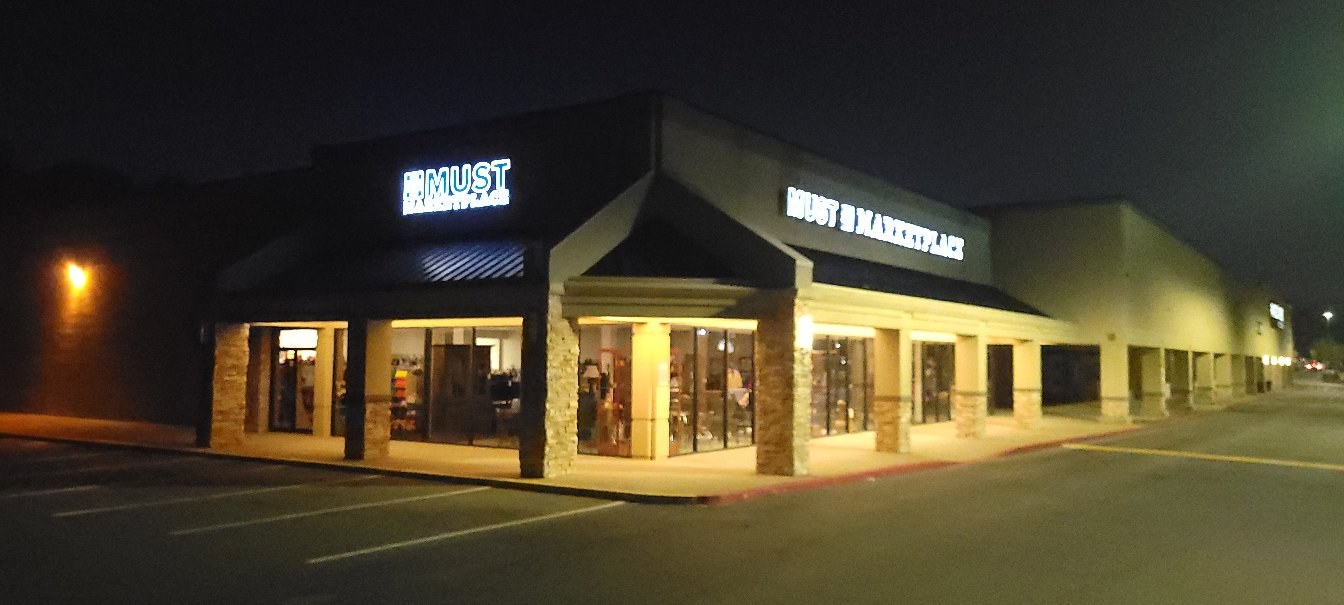 Storefront at night, MUST Marketplace, by High Stakes Creative