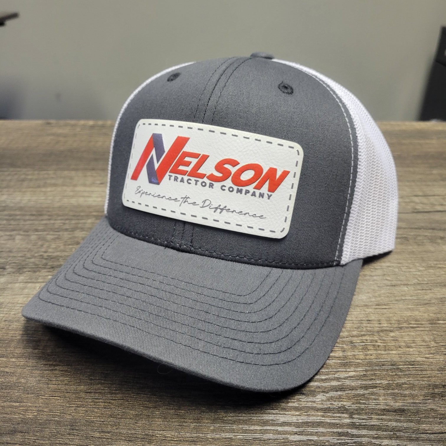 Custom printed patch trucker hat, Nelson Tractor Company, by High Stakes Creative