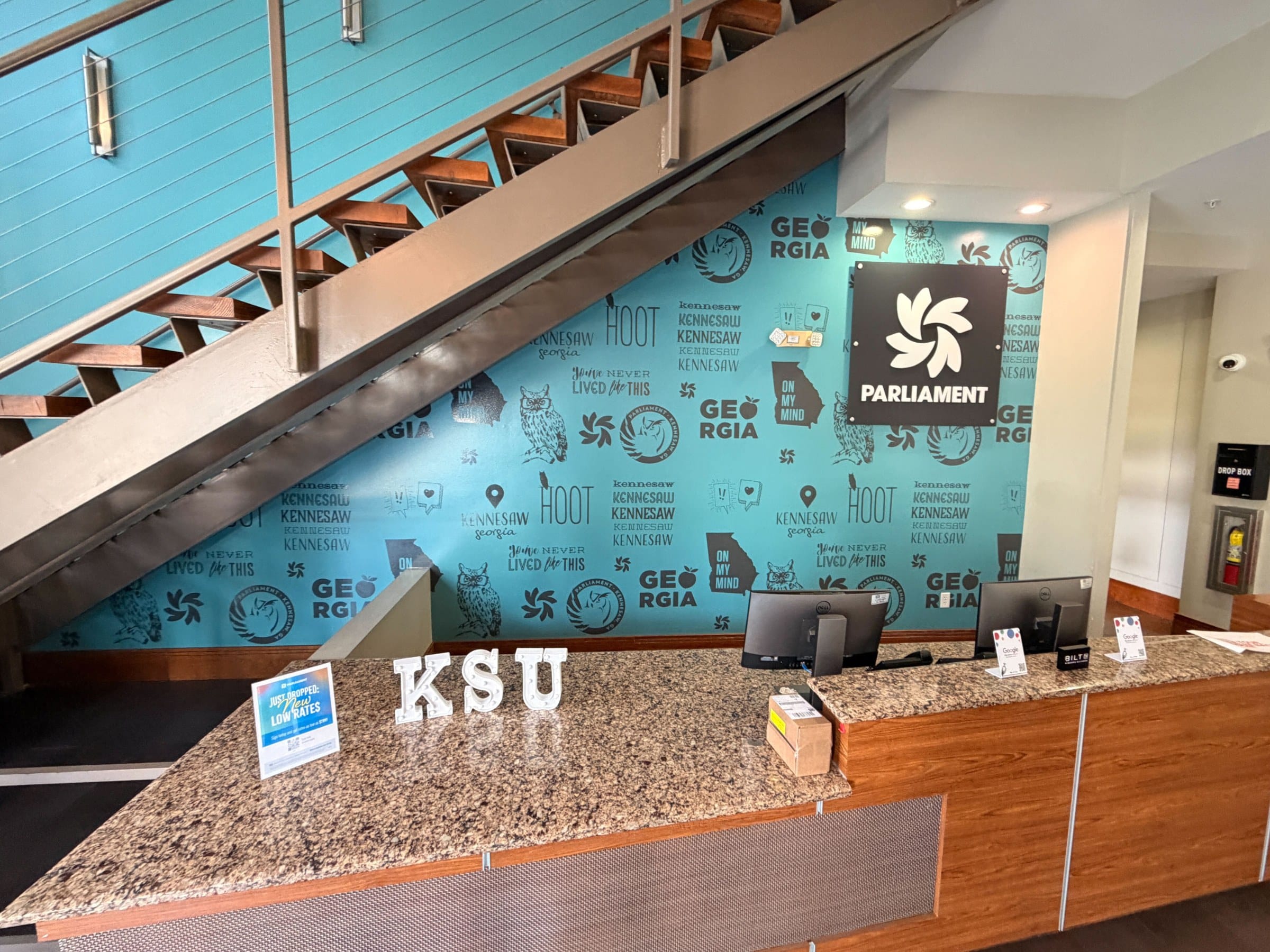Lobby wall graphic and logo panel, Parliament, Kennesaw, GA, by High Stakes Creative