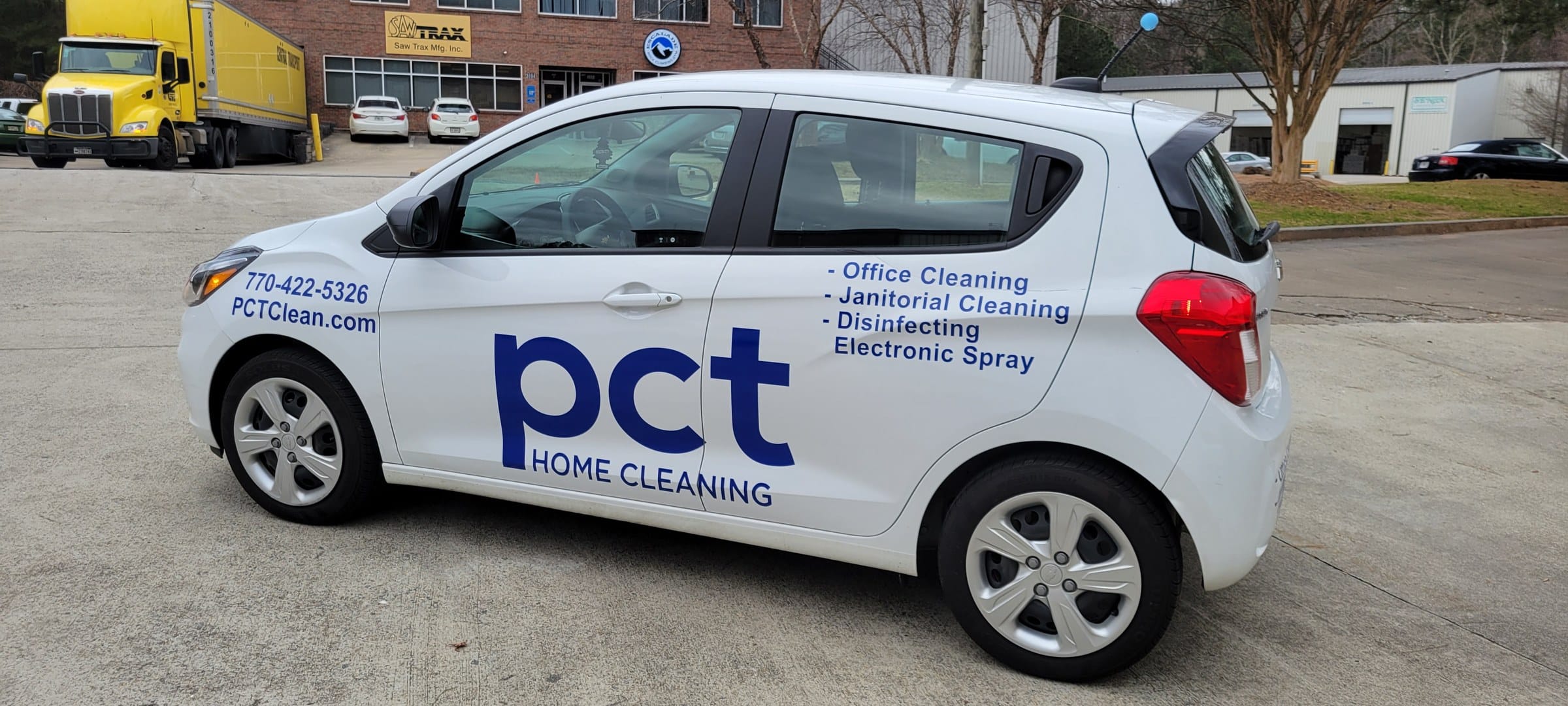 PCT Home Cleaning version of the logo on a second white Chevy Spark, PCT Home Cleaning, by High Stakes Creative