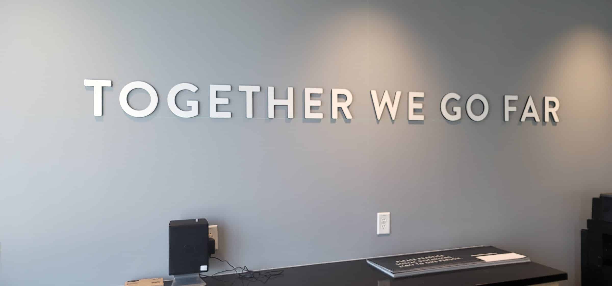 'Together We Go Far' brushed dimensional wall letters, Peloton, by High Stakes Creative