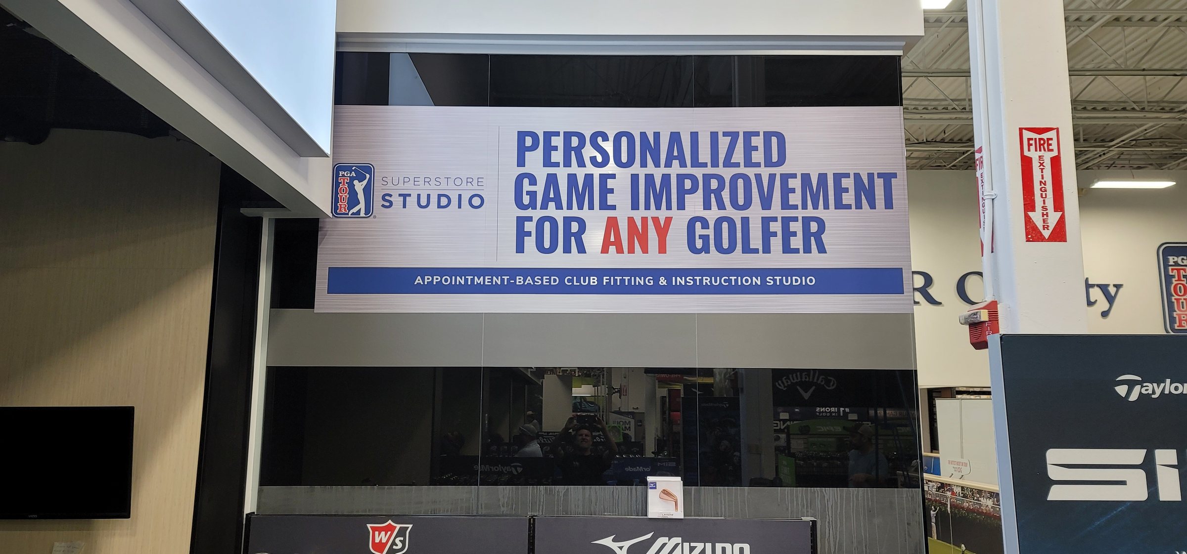 Large hanging banner for in-store club fitting studio, PGA TOUR Superstore, Roswell, GA, by High Stakes Creative