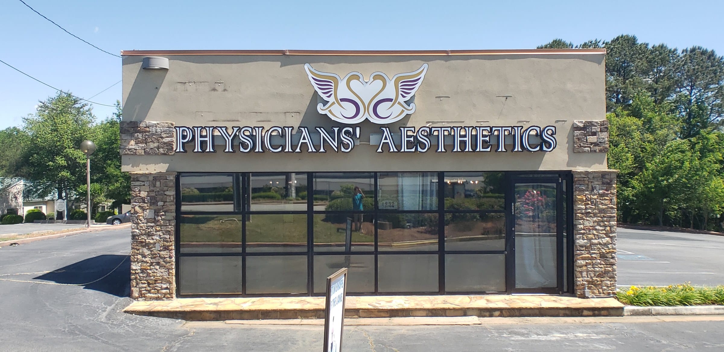 Dimensional letters and wing logo on building, Physicians' Aesthetics, by High Stakes Creative