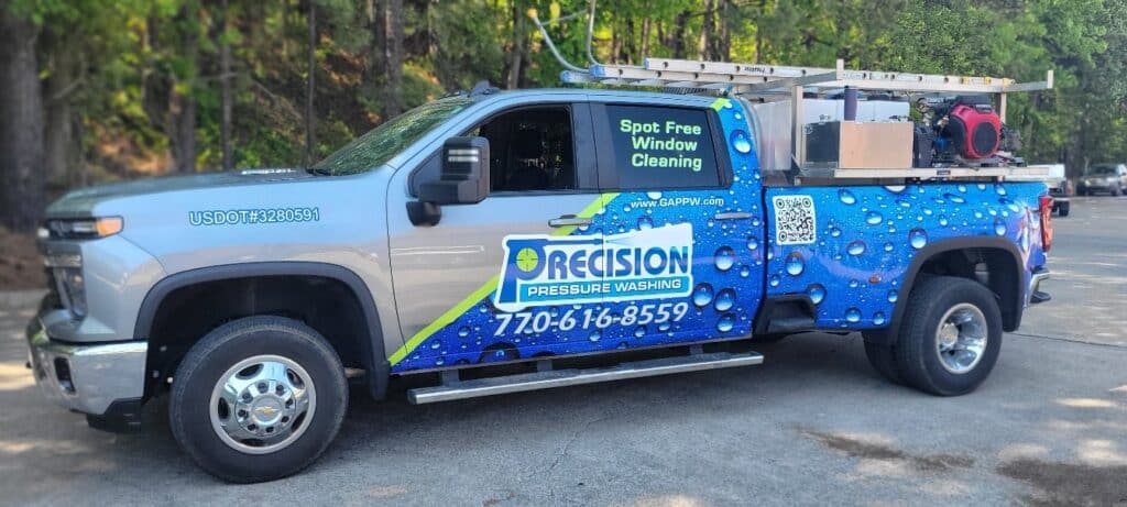 Water-droplet wrap with Precision logo and spot-free window cleaning lettering on a Chevy , Precision Pressure Washing, by High Stakes Creative