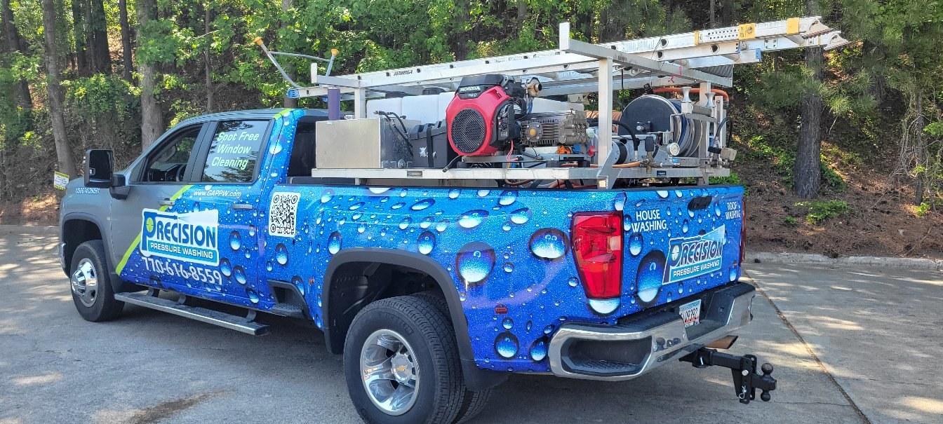 Rear three-quarter of Silverado wash truck wrap, Precision Pressure Washing, by High Stakes Creative