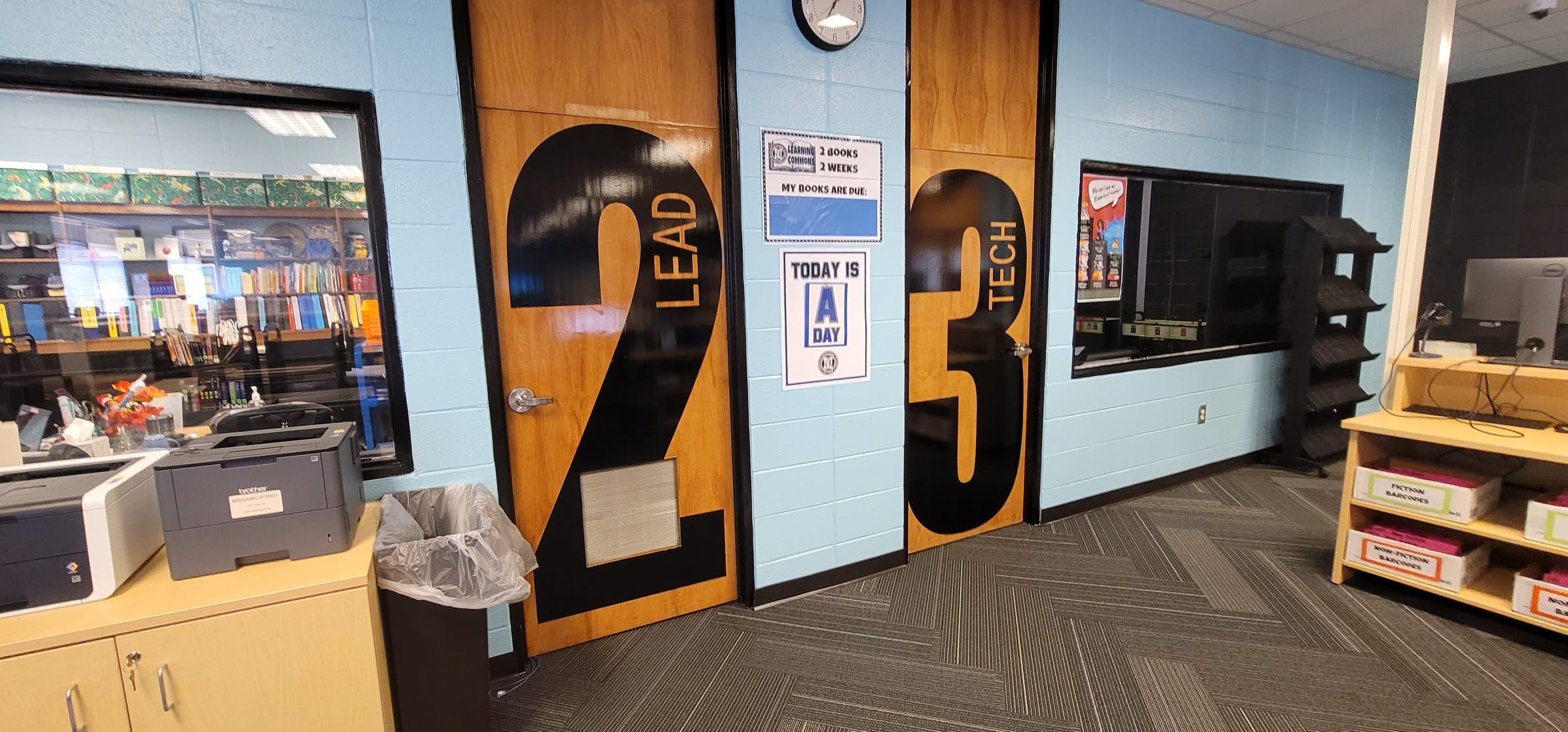 Door wraps: 2 LEAD and 3 TECH, by High Stakes Creative