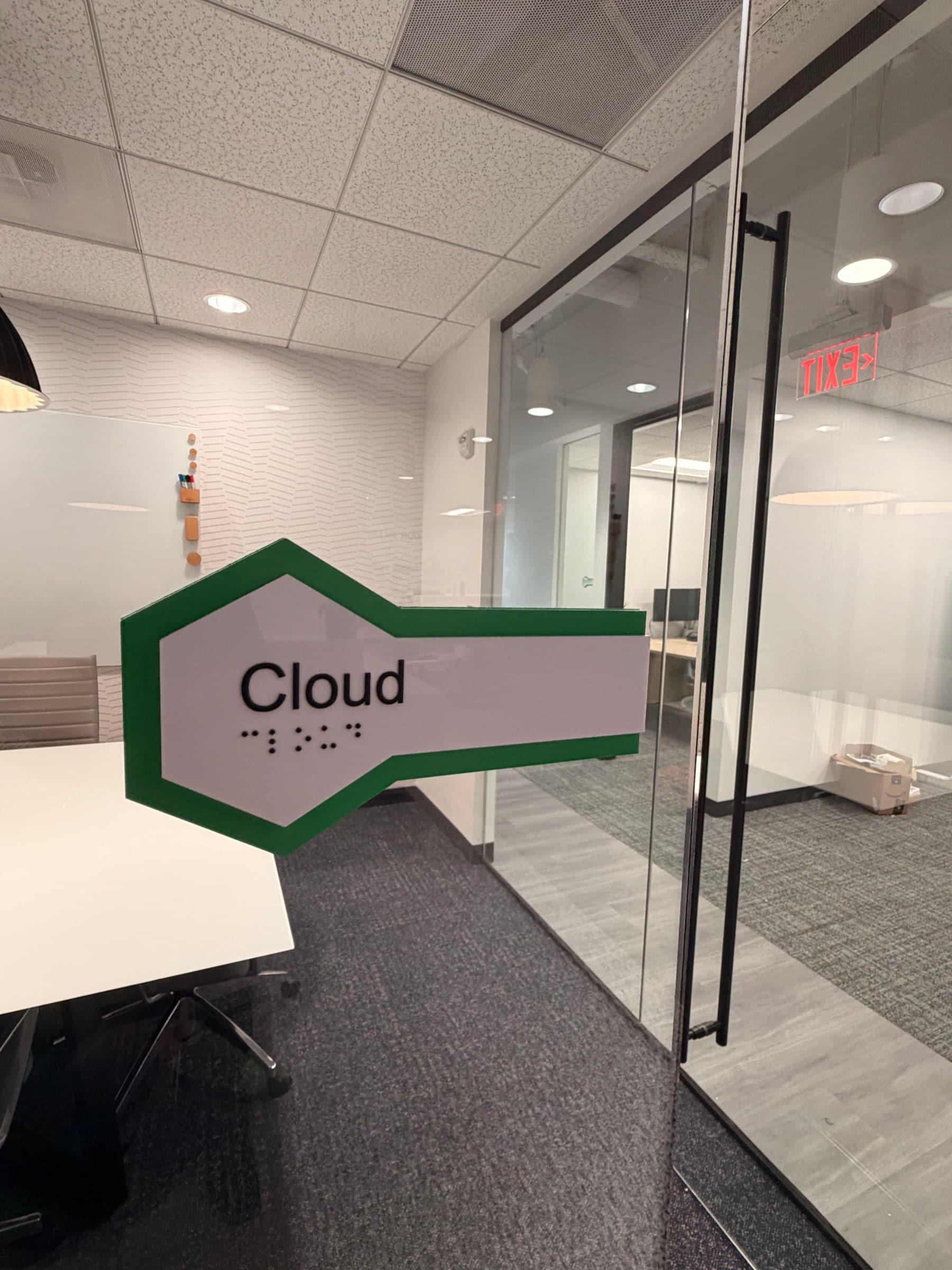 Conference room hexagon name decals on glass, SeekNow, Atlanta, GA, by High Stakes Creative