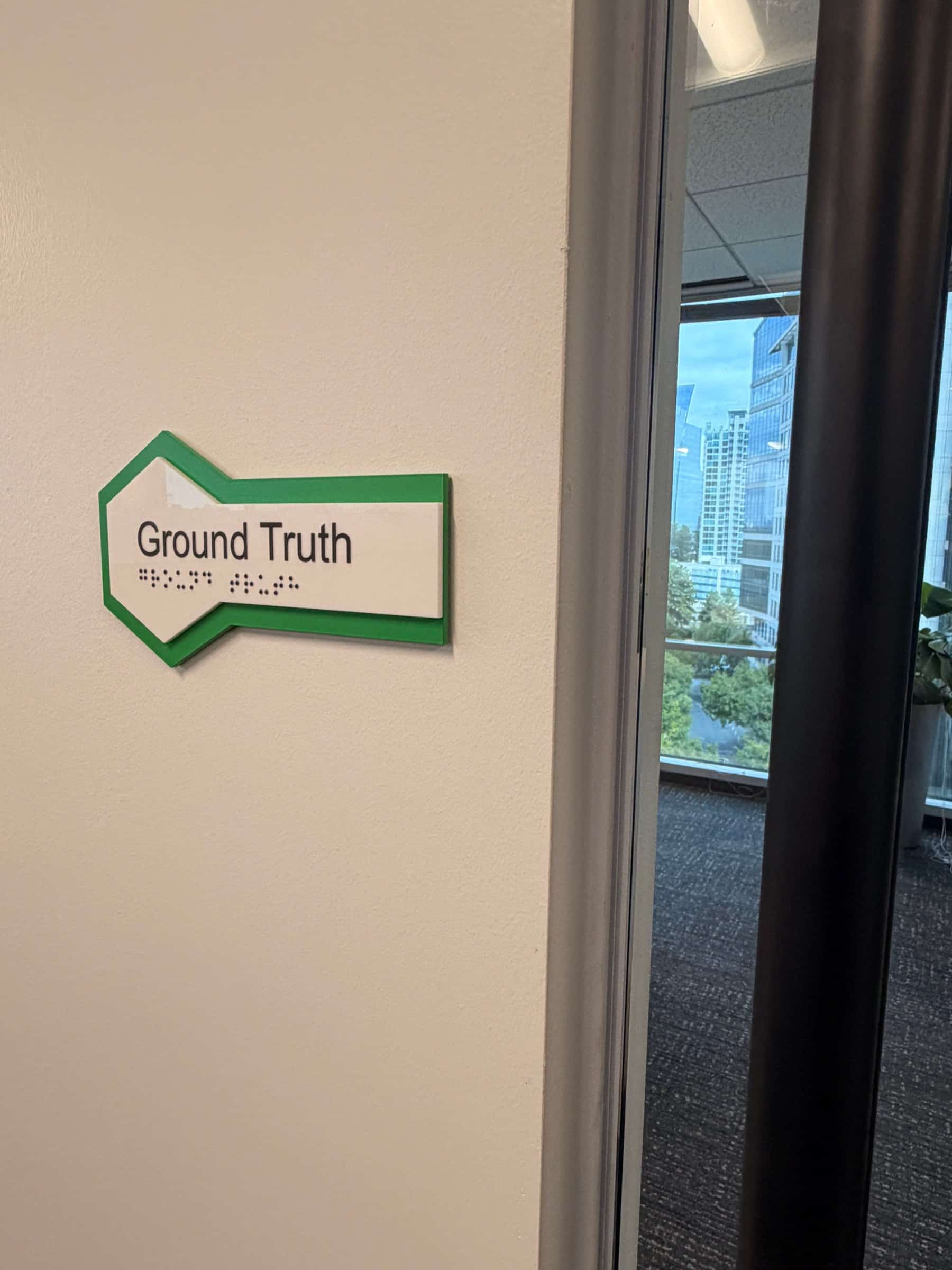 Conference room hexagon name decals on glass, SeekNow, Atlanta, GA, by High Stakes Creative