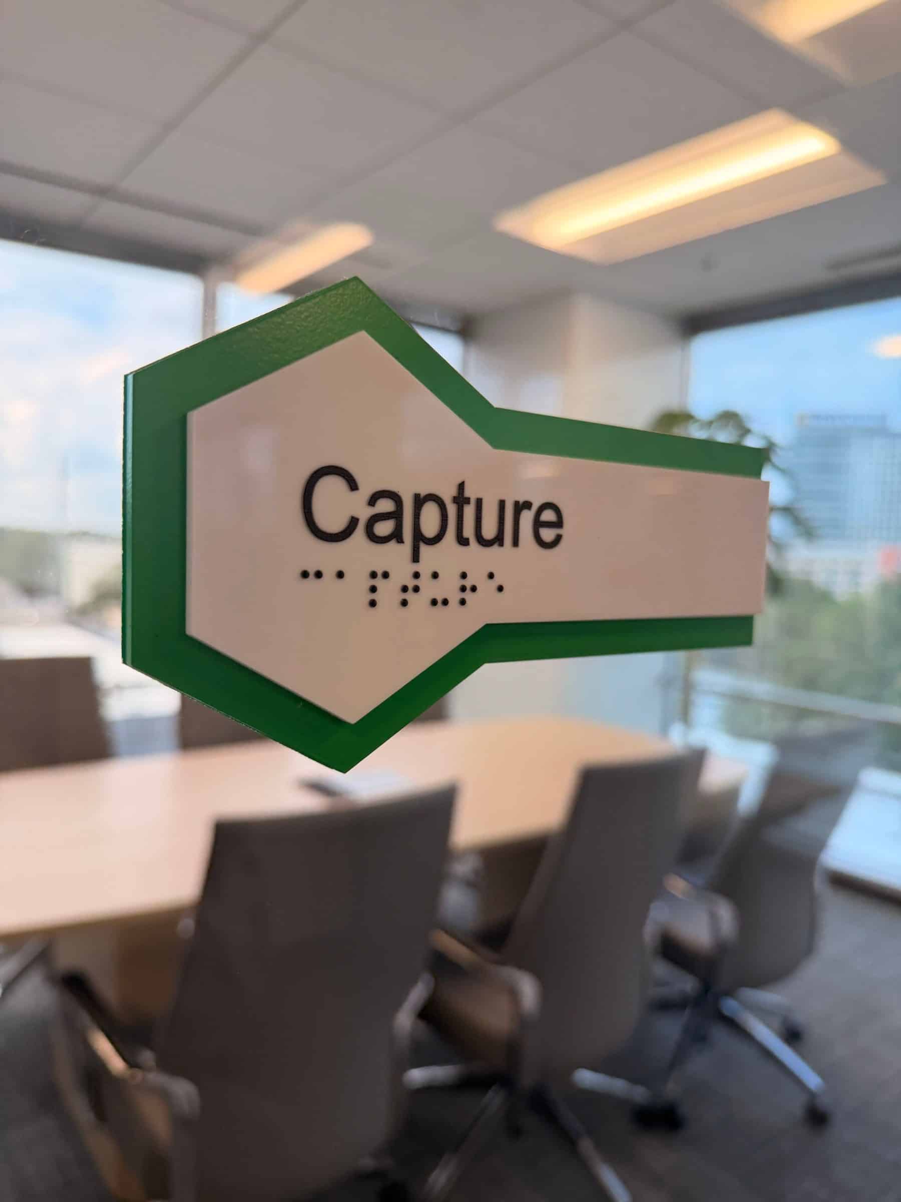 Conference room hexagon name decals on glass, SeekNow, Atlanta, GA, by High Stakes Creative
