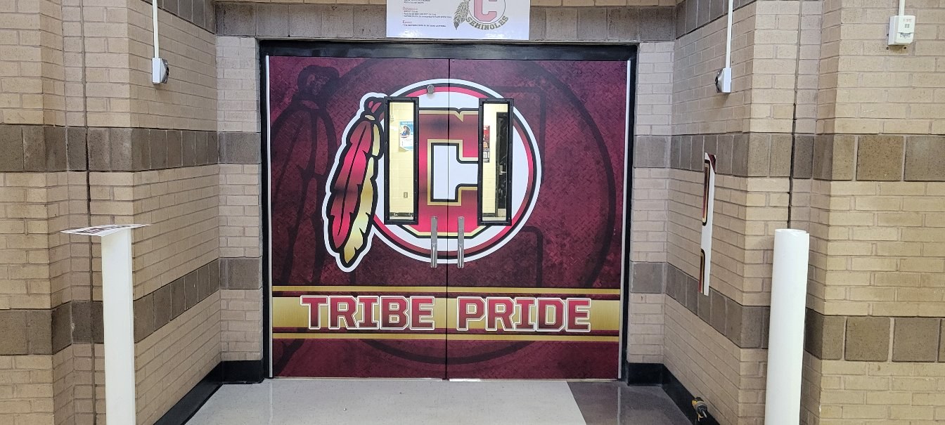 Double door wrap with C/feather logo and TRIBE PRIDE banner, Seminoles, by High Stakes Creative