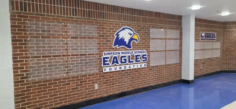 Branded donor wall graphics for the Simpson Middle School Eagles Foundation, by High Stakes Creative