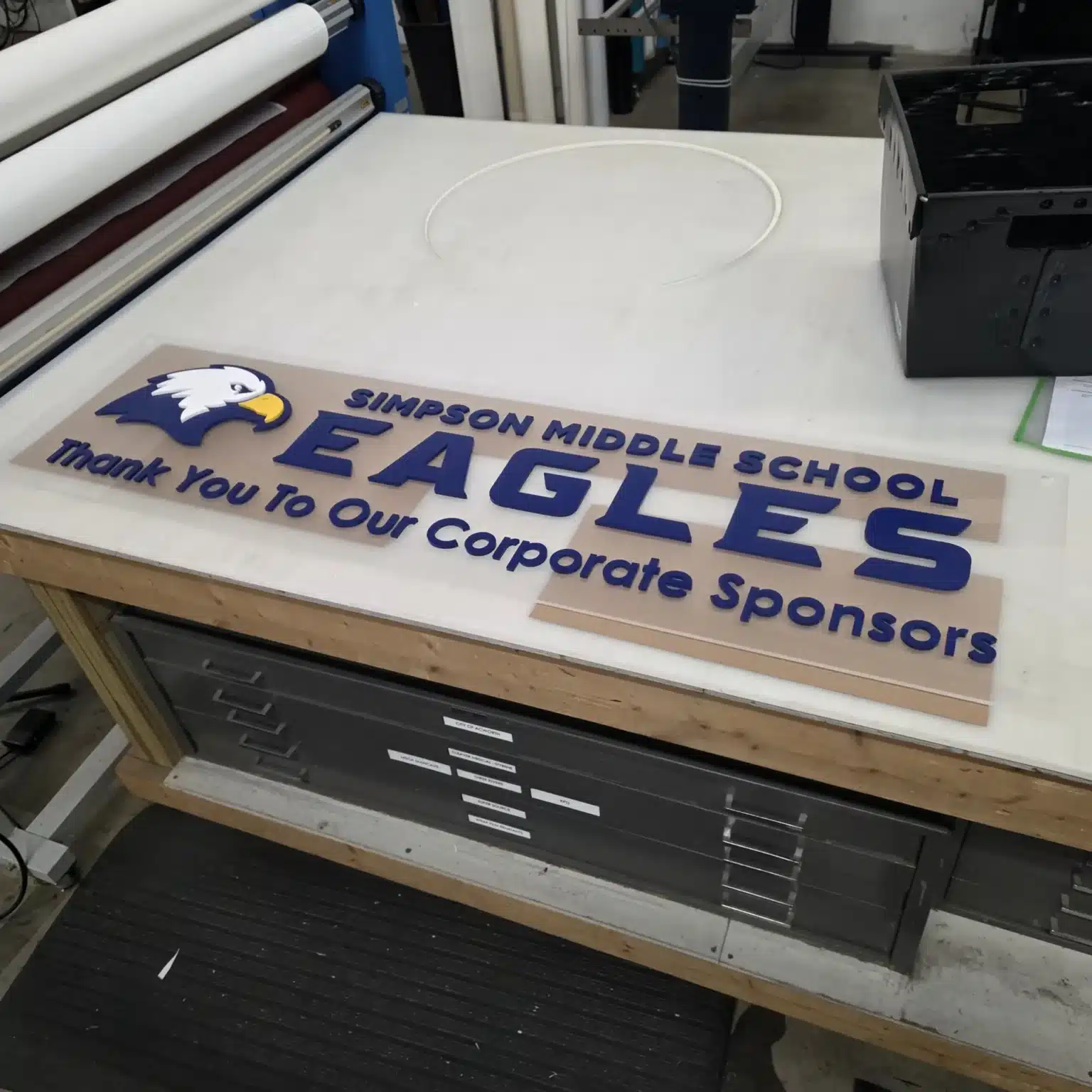 Branded donor wall graphics for the Simpson Middle School Eagles Foundation, by High Stakes Creative
