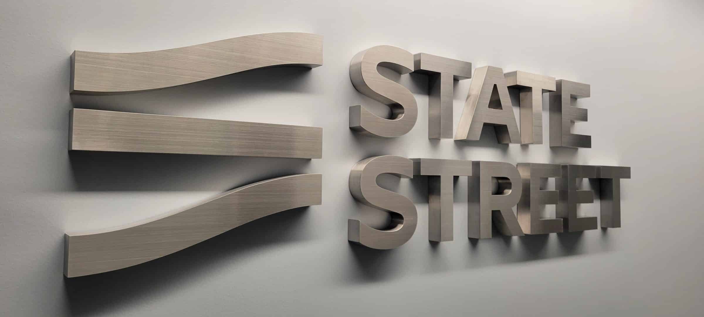 Brushed aluminum dimensional logo letters, close-up, State Street, Buckhead, GA, by High Stakes Creative
