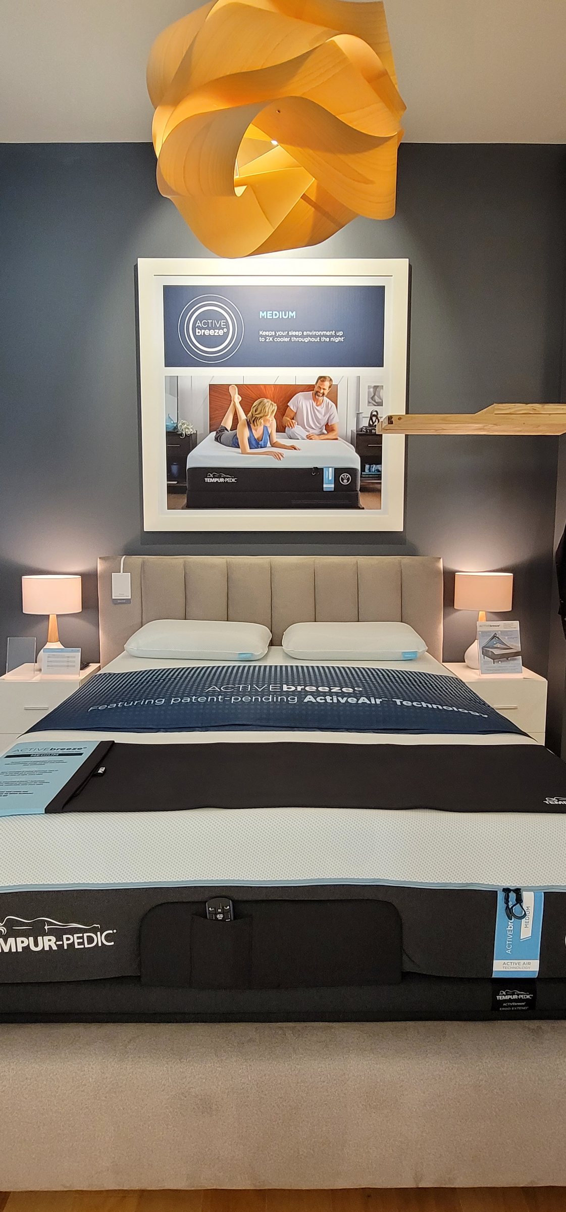Framed lifestyle graphic above mattress display, Tempur-Pedic, Alpharetta, GA, by High Stakes Creative