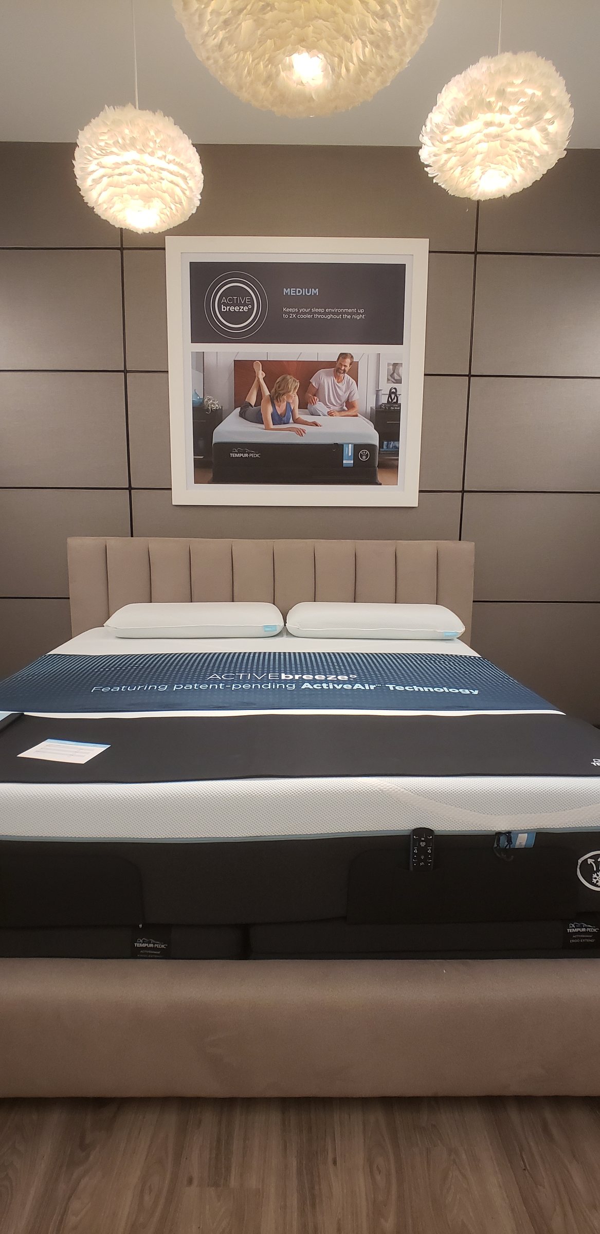 Framed lifestyle graphic above showroom bed, Tempur-Pedic, Atlanta, GA, by High Stakes Creative