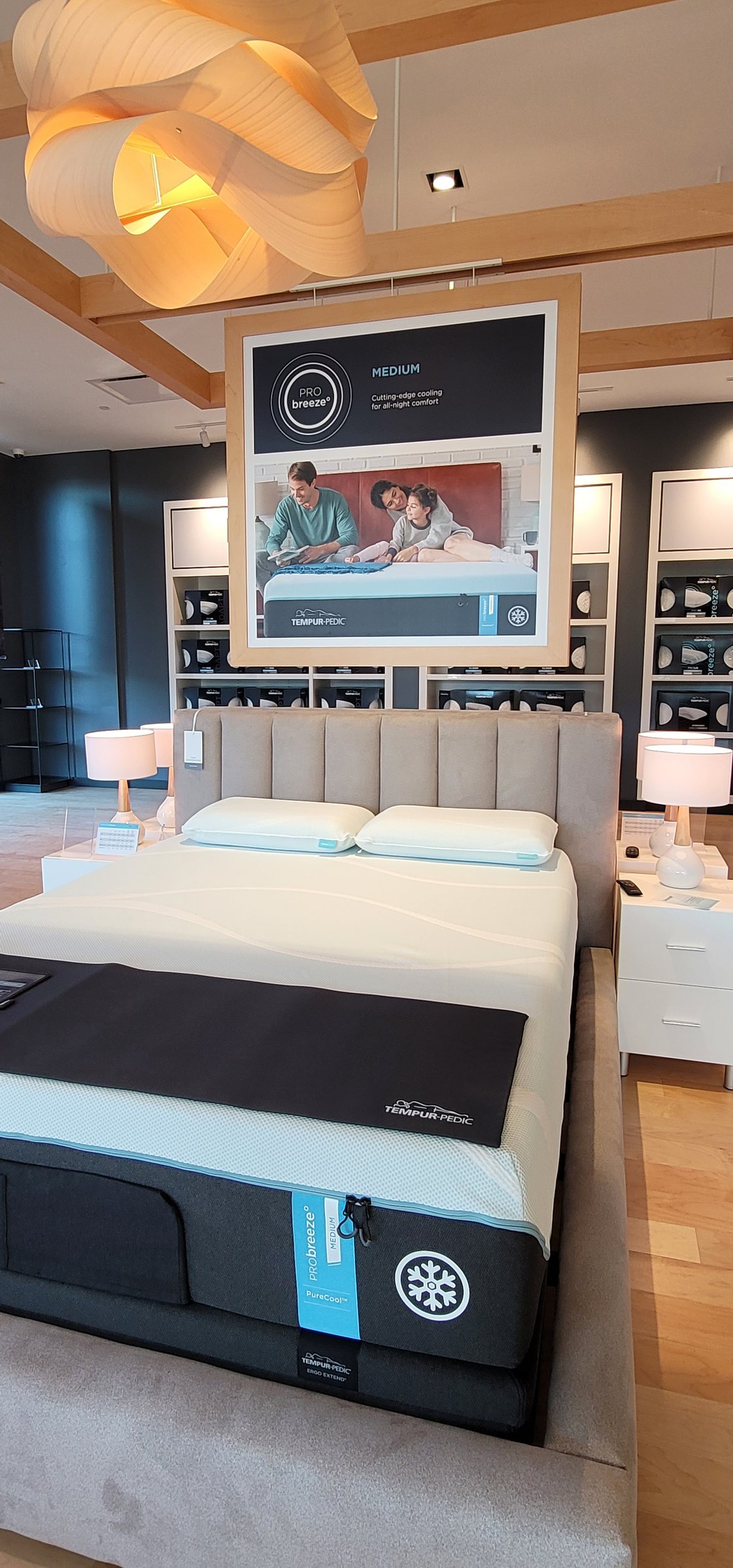 Suspended lifestyle graphic over showroom bed, Tempur-Pedic, Alpharetta, GA, by High Stakes Creative