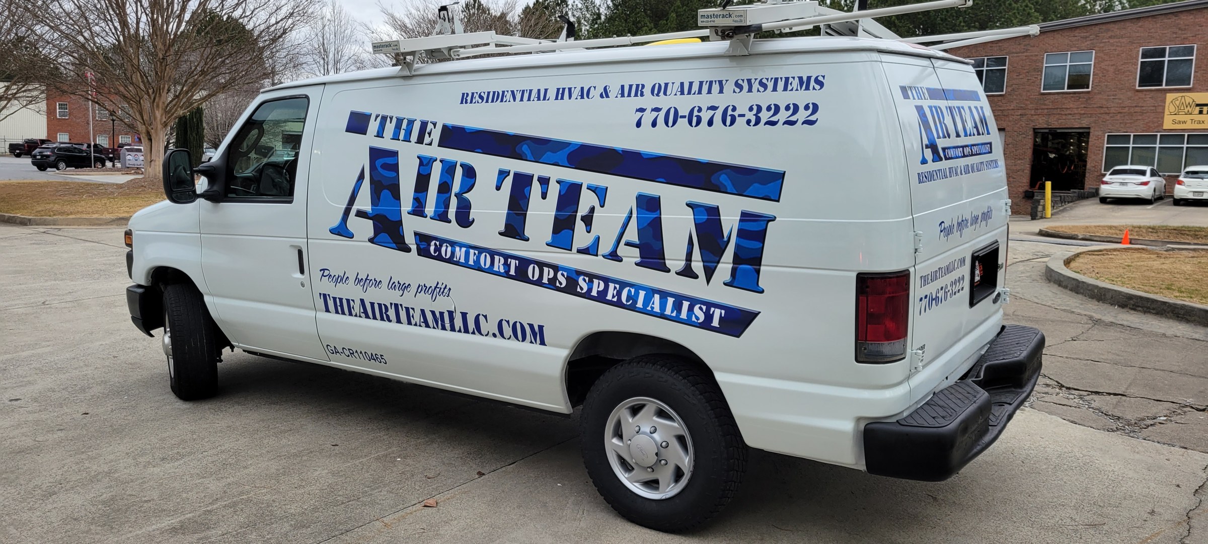 Rear three-quarter of Air Team van graphics, The Air Team, by High Stakes Creative