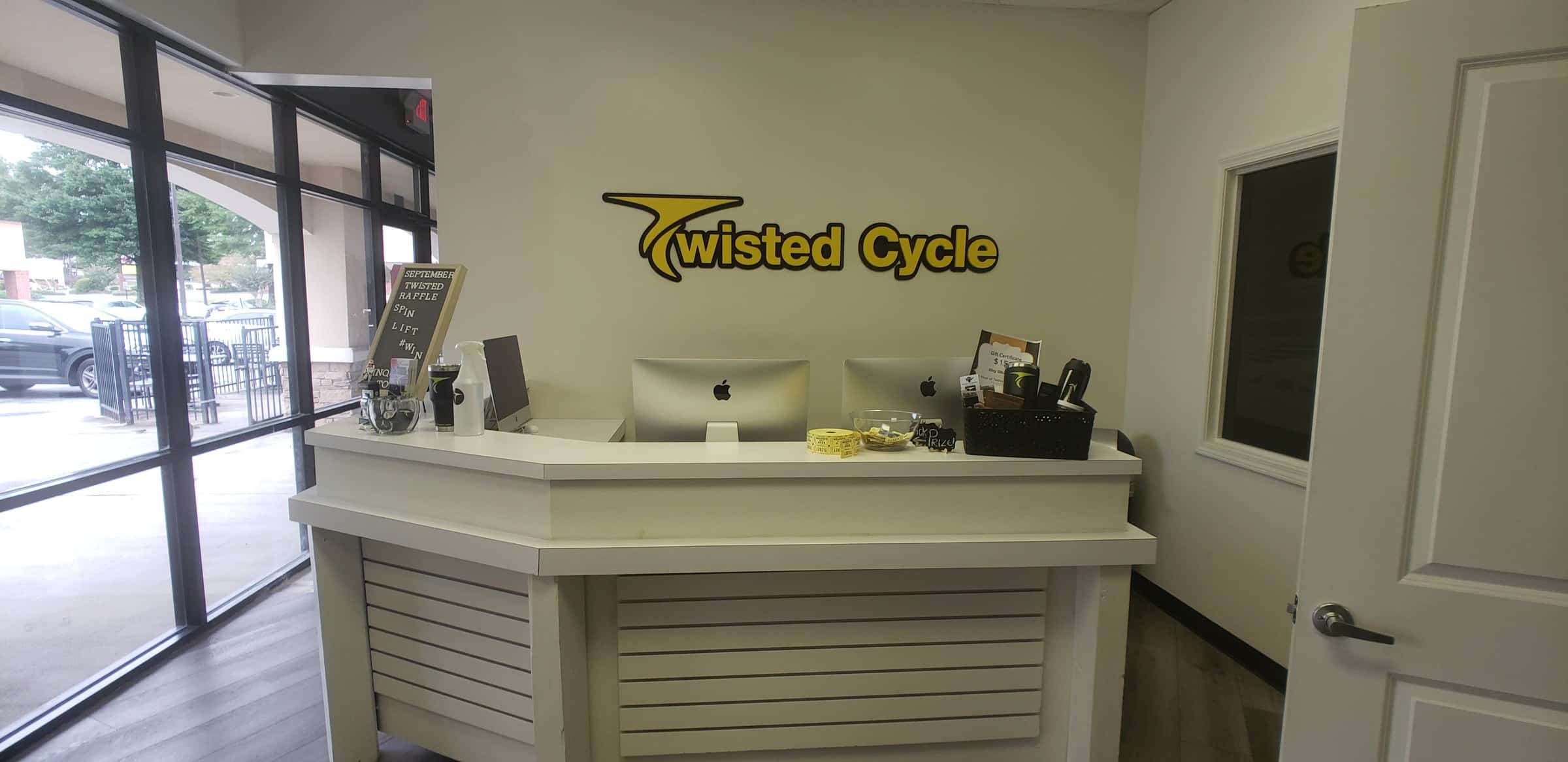 Dimensional lobby logo above reception, Twisted Cycle, Woodstock, GA, by High Stakes Creative