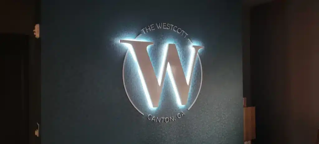 Halo-lit lobby logo, The Westcott, Canton GA, by High Stakes Creative, metro Atlanta