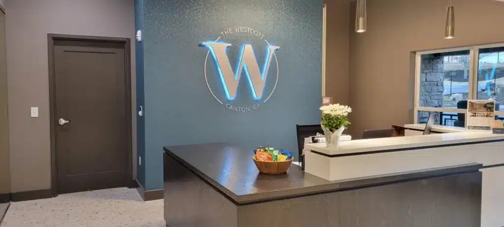 Leasing office lobby branding, The Westcott, Canton GA, by High Stakes Creative